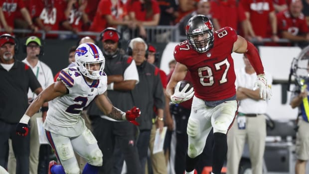 Dec 12, 2021; Tampa, Florida, USA; Tampa Bay Buccaneers tight end Rob Gronkowski (87) runs with the ball against the Buffalo Bills during overtime at Raymond James Stadium. Mandatory Credit: Kim Klement-USA TODAY Sports